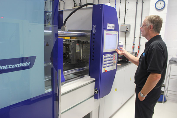 WHP Managing Director Paul Bobby with the company's first Wittmann Battenfeld SmartPower