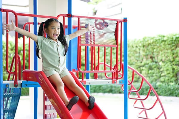 Ampacet UVProtect: girl on slide