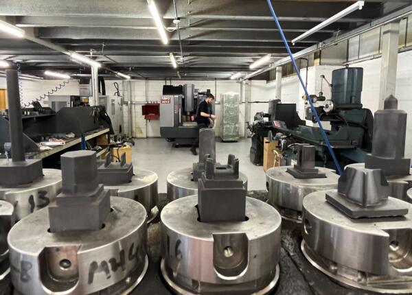 Electrodes foreground with machining centre background (1)